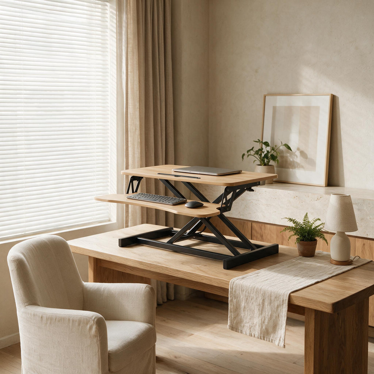 32-Inch Sit-Stand Desk Converter — styled in a warm neutral interior