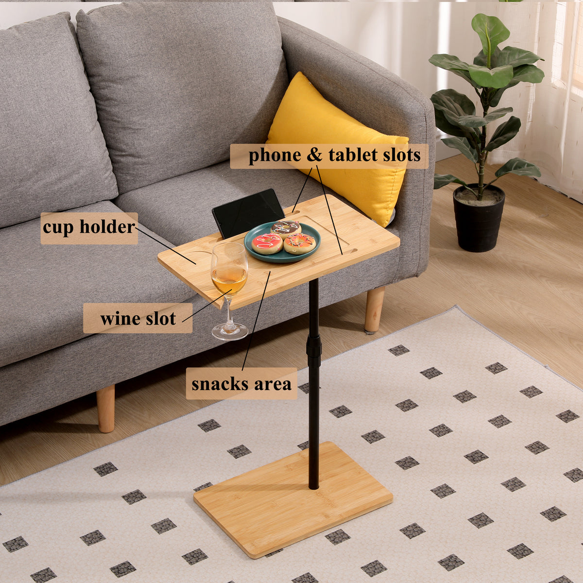 Device slots and glass holder on the bamboo end table