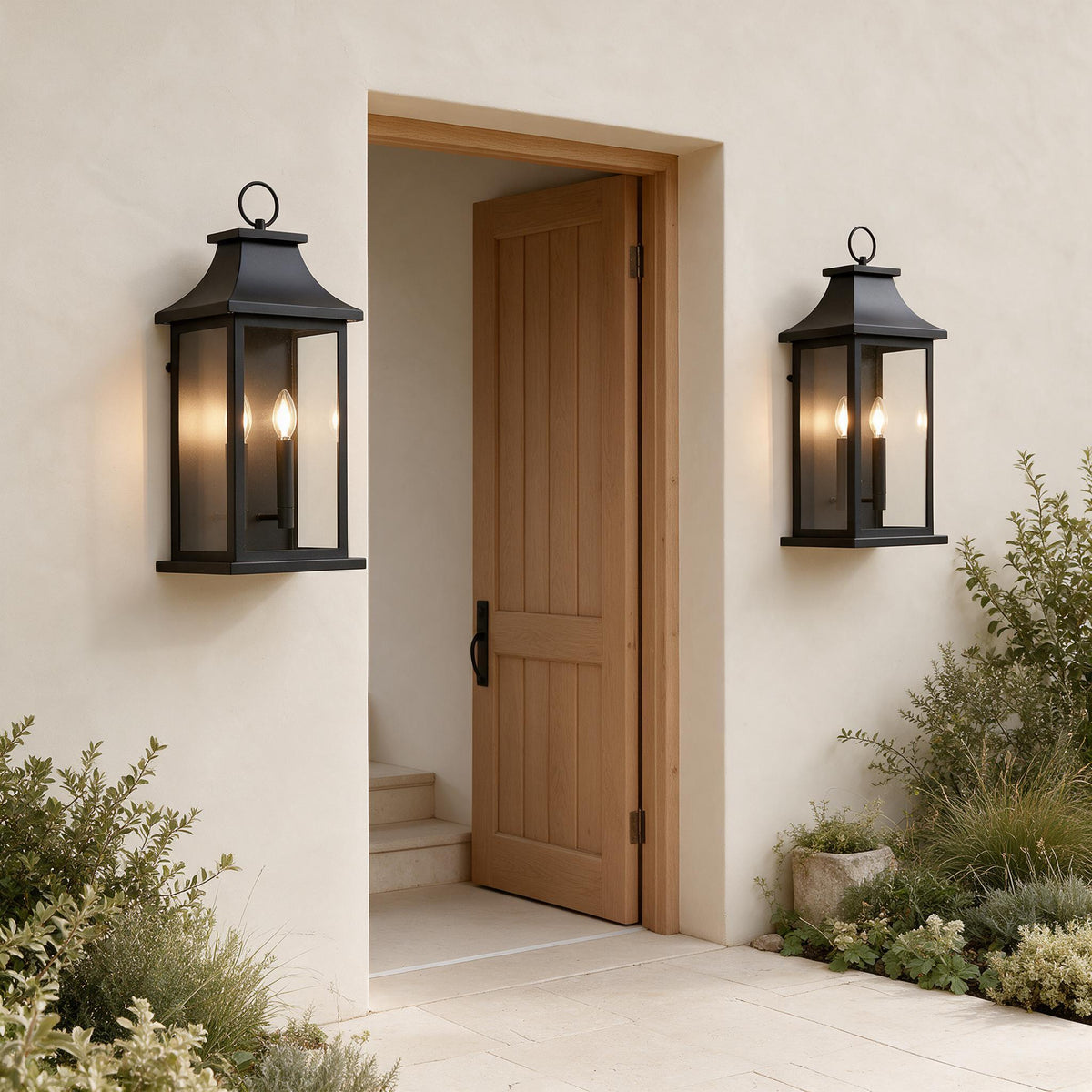 Dusk-to-Dawn Grand Wall Lanterns — Set of 2 — styled in a calm outdoor setting