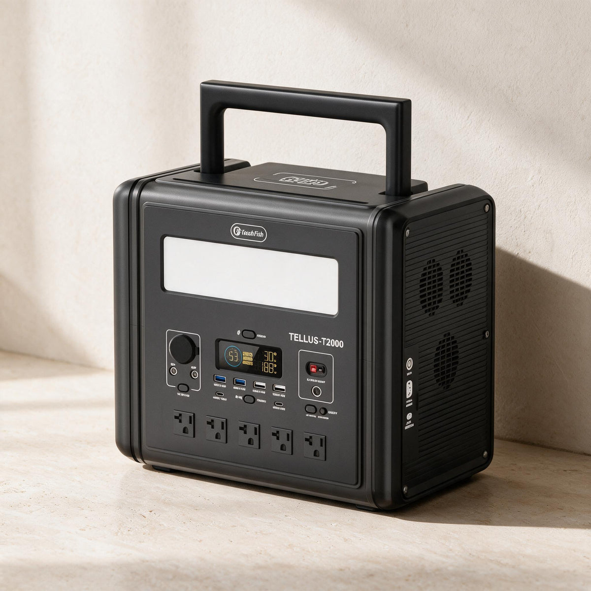 FlashFish T2000 portable power station — three-quarter product view against warm ivory limestone.
