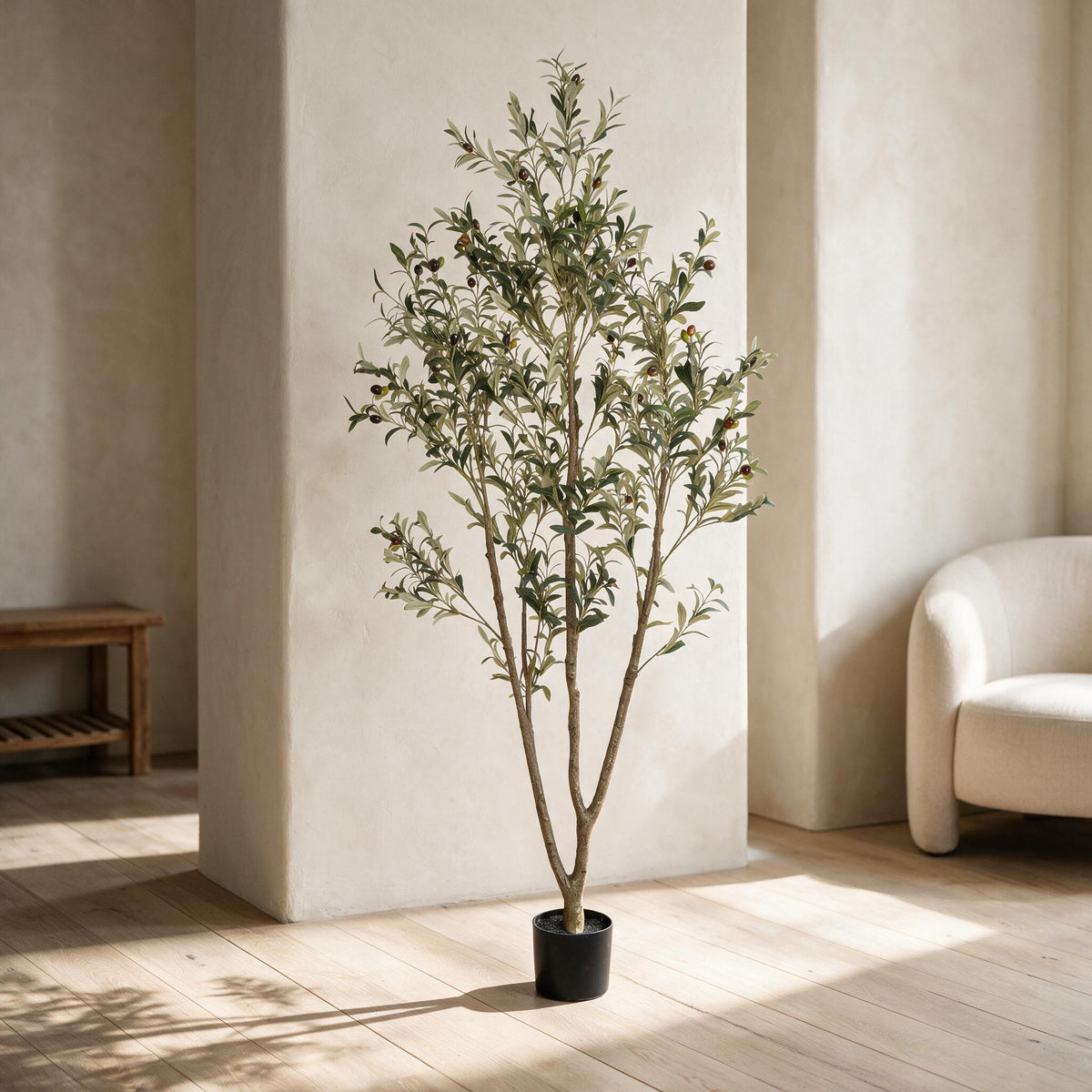 Artificial Olive Tree - 6 ft — styled in a warm neutral indoor setting.