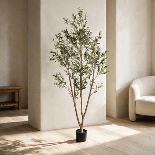 Artificial Olive Tree - 6 ft — styled in a warm neutral indoor setting.