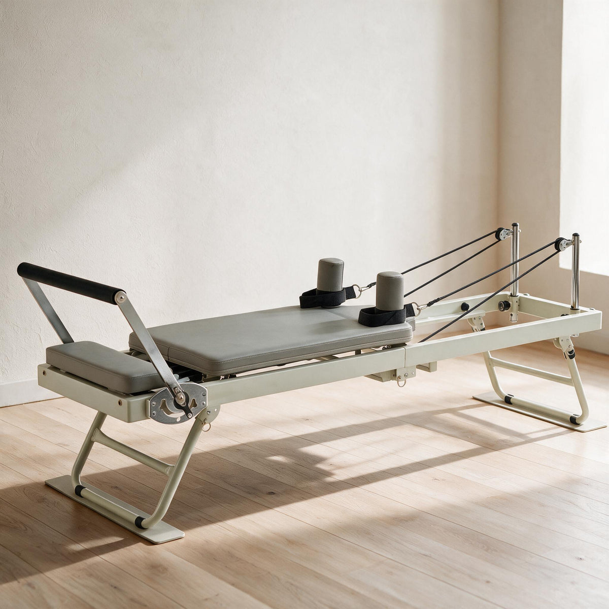 VEVOR Folding Pilates Reformer - Gray — styled in a warm neutral indoor setting.