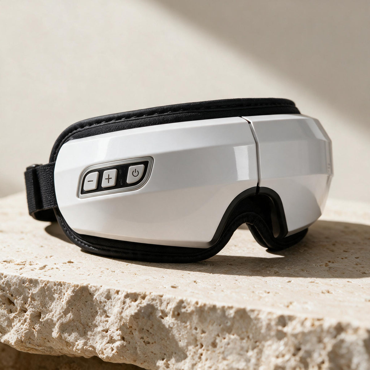 White Heated Eye Massager, close-up of original material and design details.