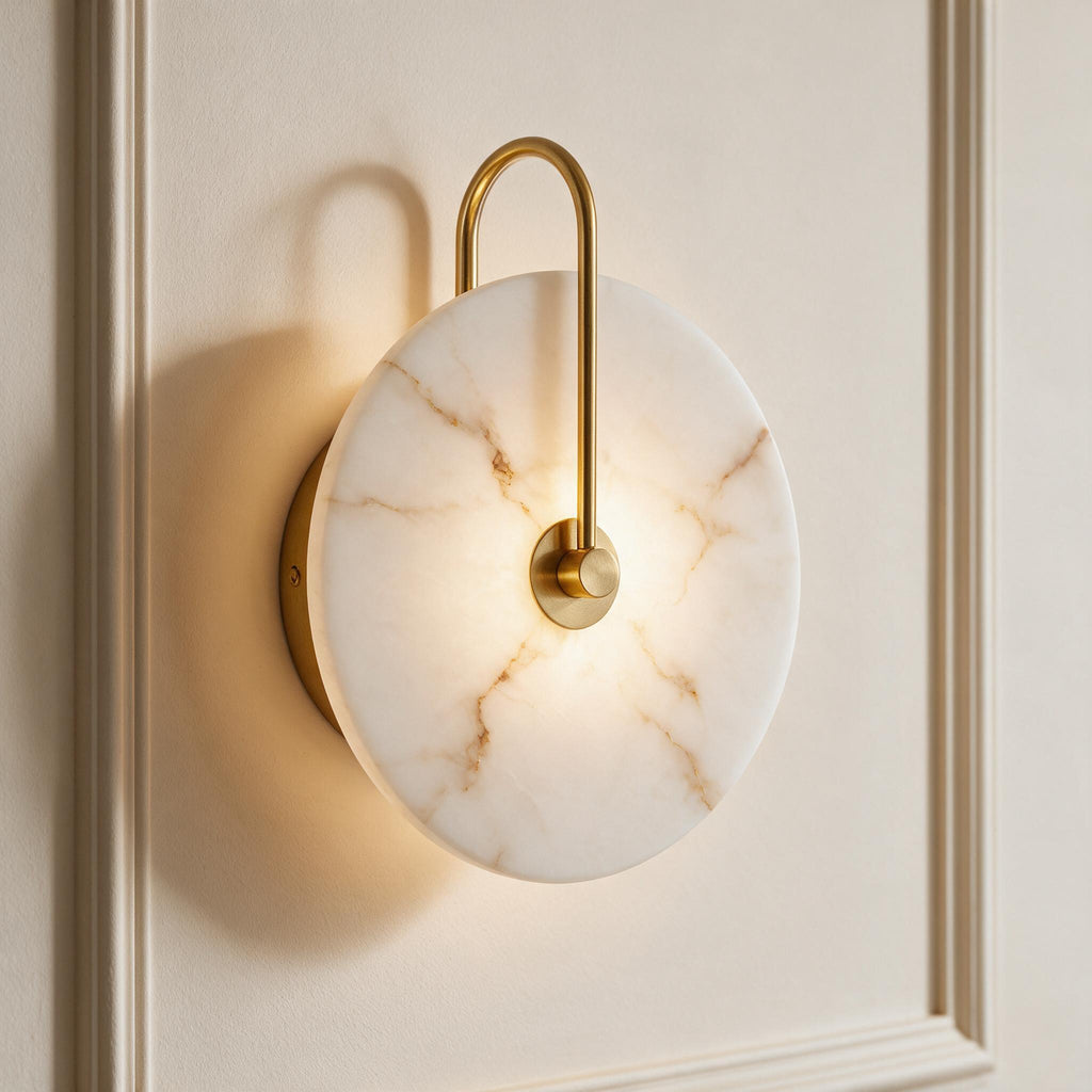 Sculptural Disc Wall Light — full product in a warm ivory setting