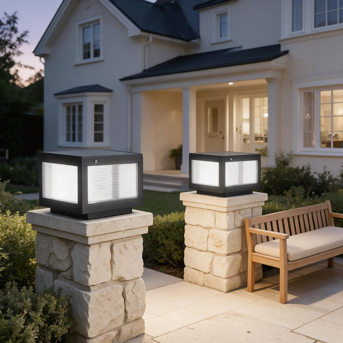 Solar Pillar Lights — Set of 2 — styled in a calm outdoor setting