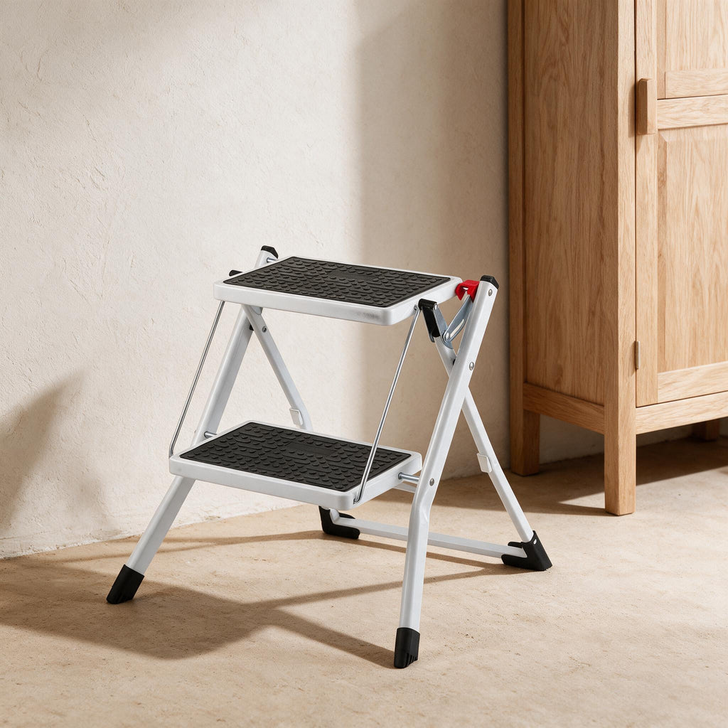 VEVOR Folding Step Stool - 2 Steps — styled in a warm neutral indoor setting.