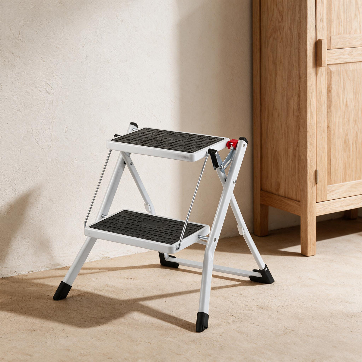 VEVOR Folding Step Stool - 2 Steps — styled in a warm neutral indoor setting.