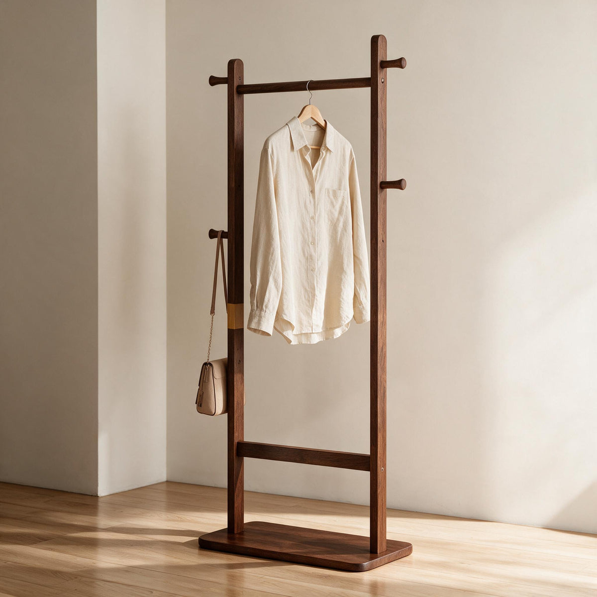 Wooden Coat Rack - Walnut Finish — styled in a warm neutral indoor setting.