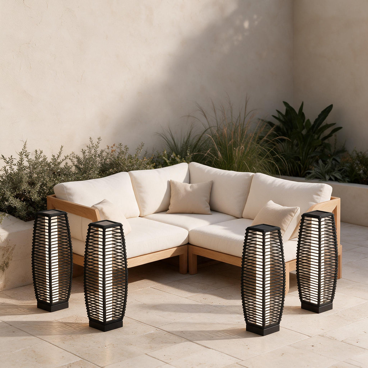 Woven Solar Patio Lanterns — Set of 4 — styled in a calm outdoor setting